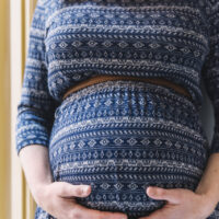 pregnant-woman-front-balcony